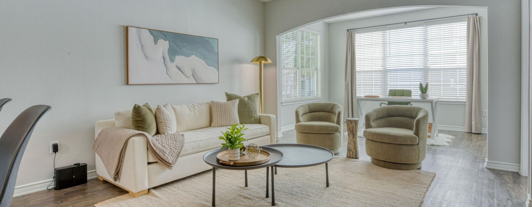 a living room with a couch and a table
